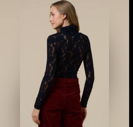 After Dark, lace turtleneck statement top