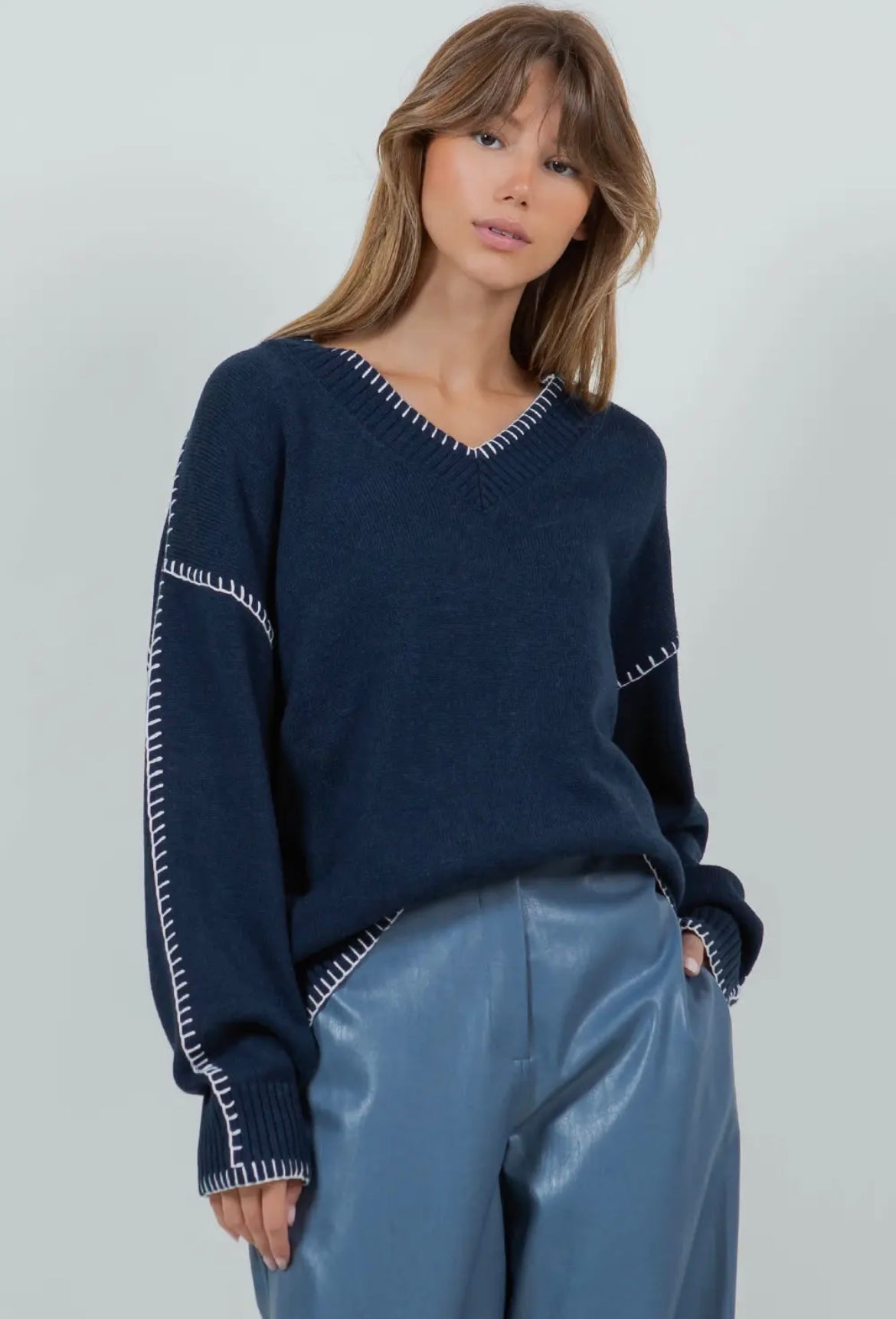 Whipstich, contrast blanket stitched navy sweater