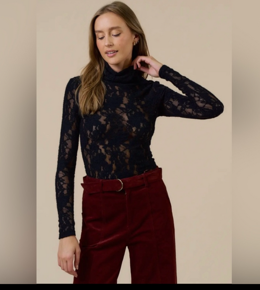 After Dark, lace turtleneck statement top