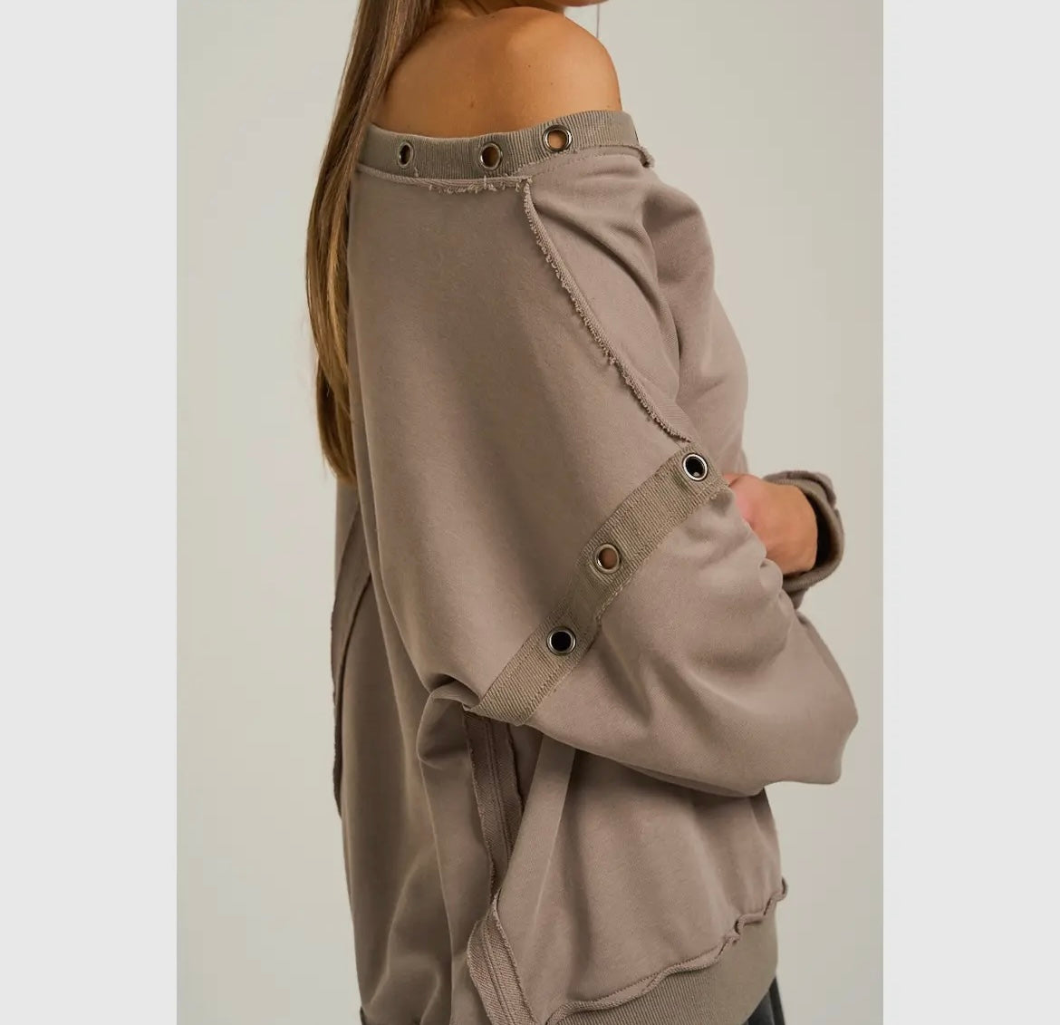 The Elevate, off the shoulder grommet embellished top