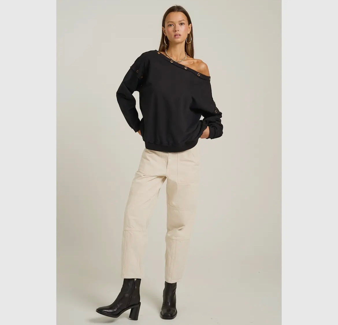 The Elevate, off the shoulder grommet embellished top